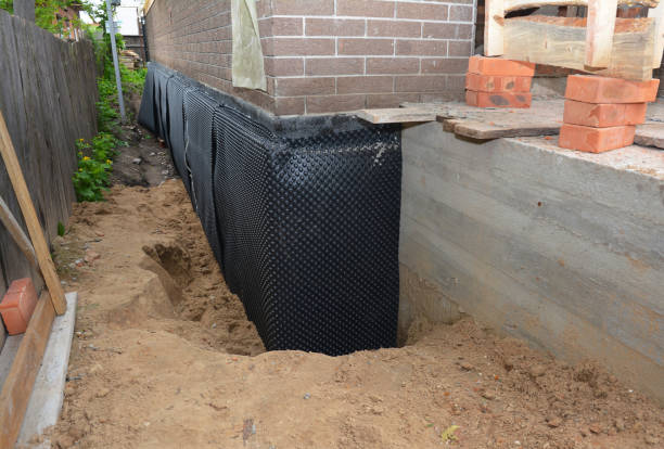 SJ Waterproofing Pros technician performing targeted Vapor Barrier Installation assessment in Fork, MD